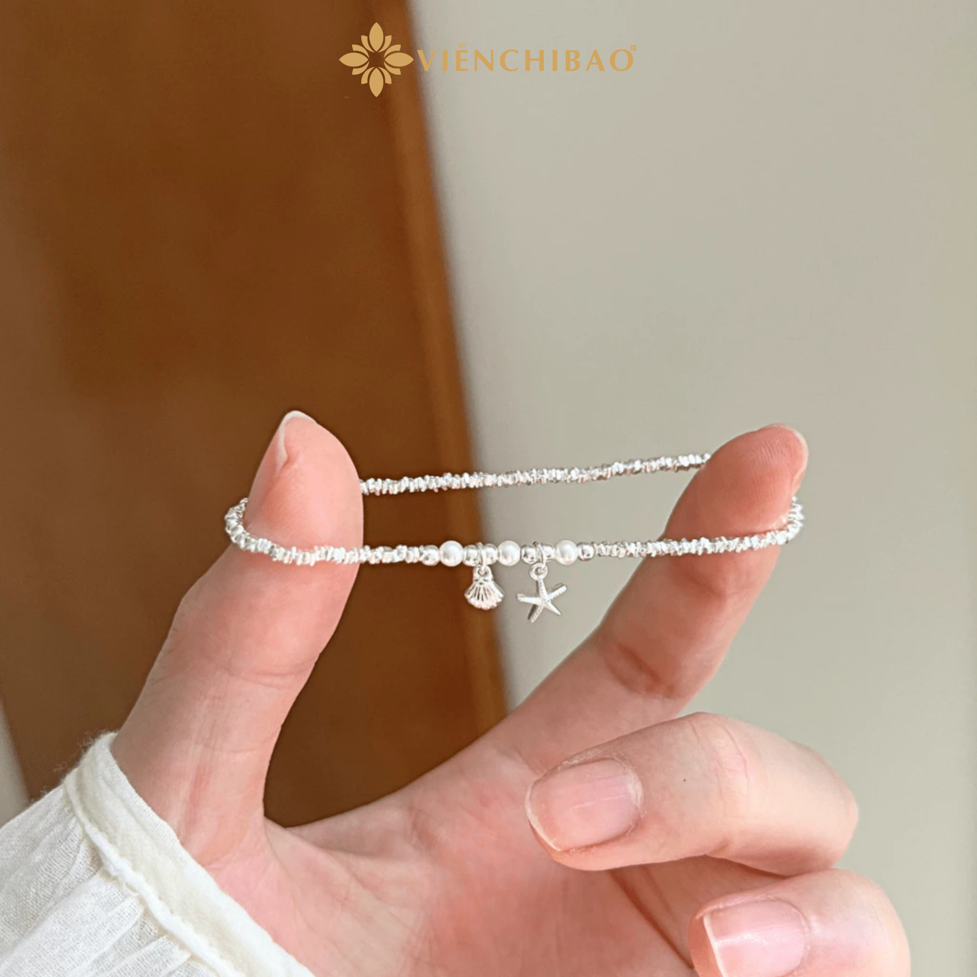 Lắc tay sao biển đính ngọc trai